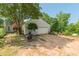 Detached garage with ample storage space and a yard maintenance equipment at 2229 S Van Wert S Rd, Villa Rica, GA 30180