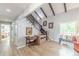 Hallway and staircase with wood flooring leading to bedrooms at 2229 S Van Wert S Rd, Villa Rica, GA 30180