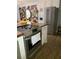 Bright kitchen featuring stainless steel appliances, light cabinetry, and wood countertops and floors at 2229 S Van Wert S Rd, Villa Rica, GA 30180