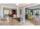 Spacious open-concept living room showcases hardwood floors and seamless transitions to dining and living areas at 2229 S Van Wert S Rd, Villa Rica, GA 30180