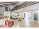 Open-concept living space with lots of seating, natural light, and wood floors at 2229 S Van Wert S Rd, Villa Rica, GA 30180