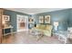 Comfortable living room features hardwood floors, with a seamless transition to the entryway and serene decor at 2229 S Van Wert S Rd, Villa Rica, GA 30180