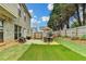 Wide angle view of the spacious, fenced backyard and patio at 2837 Peachstone Ct, Lawrenceville, GA 30043