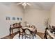 Dining room with wood-style floors, seating and decorations at 2837 Peachstone Ct, Lawrenceville, GA 30043