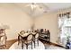 Dining room with wood-style floors, seating, a window and decorations at 2837 Peachstone Ct, Lawrenceville, GA 30043