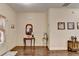 Elegant entryway with hardwood floors, detailed trim, and a decorative table with a mirror at 2837 Peachstone Ct, Lawrenceville, GA 30043