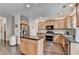 The well-appointed kitchen includes an island with granite countertop at 2837 Peachstone Ct, Lawrenceville, GA 30043