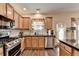 This cozy kitchen features granite countertops and a dishwasher at 2837 Peachstone Ct, Lawrenceville, GA 30043