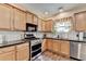 This spacious kitchen features granite countertops at 2837 Peachstone Ct, Lawrenceville, GA 30043