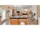 This kitchen overlooks the living room and features an island at 2837 Peachstone Ct, Lawrenceville, GA 30043