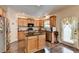 Beautiful kitchen featuring granite counters, hardwood floors, and stainless steel appliances at 2837 Peachstone Ct, Lawrenceville, GA 30043