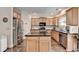 This spacious kitchen features an island and stainless steel appliances at 2837 Peachstone Ct, Lawrenceville, GA 30043