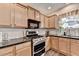 This well-lit kitchen has granite countertops and an oven at 2837 Peachstone Ct, Lawrenceville, GA 30043