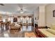 Open-concept living area with fireplace, wood floors, and abundant natural light at 2837 Peachstone Ct, Lawrenceville, GA 30043