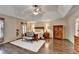 Large main bedroom features a tray ceiling and hardwood floors at 2837 Peachstone Ct, Lawrenceville, GA 30043