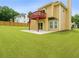 Backyard with a green grass lawn and a wooden deck at 2928 Riverset Ct, Decatur, GA 30034