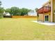 Backyard with large green grass lawn and wooden deck at 2928 Riverset Ct, Decatur, GA 30034