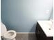 Well-lit bathroom with modern fixtures, a stylish vanity, and a toilet at 2928 Riverset Ct, Decatur, GA 30034