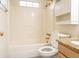 Bathroom features a bathtub, cabinet storage, and sink at 2928 Riverset Ct, Decatur, GA 30034