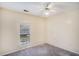 Bedroom featuring carpet, a window with blinds and neutral colored walls at 2928 Riverset Ct, Decatur, GA 30034