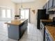 Modern kitchen with granite countertops, stainless steel appliances, island and access to sliding door at 2928 Riverset Ct, Decatur, GA 30034