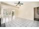 Bright, open-concept living room featuring a fireplace, tile floors, and access to the dining area at 2928 Riverset Ct, Decatur, GA 30034
