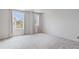 Bright, carpeted bedroom with two windows bringing in natural light and neutral-toned walls at 3546 Sorrel Ln, Duluth, GA 30096