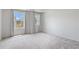 Bright, carpeted bedroom with two windows bringing in natural light and neutral-toned walls at 3546 Sorrel Ln, Duluth, GA 30096