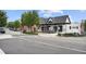 Street view of a commercial building featuring retail spaces and a corner location on a sunny day at 3546 Sorrel Ln, Duluth, GA 30096