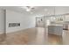 Bright and airy living room with hardwood floors and a modern fireplace at 3546 Sorrel Ln, Duluth, GA 30096