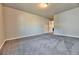 Neutral bedroom with plush carpeting and access to a walk-in closet at 3557 Bryant Meadows Cir, Buford, GA 30519