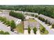 Aerial shot of a neighborhood with lush landscaping and well-maintained homes at 7628 Summer Berry Ln, Lithonia, GA 30038