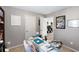 Office with desk, chair, and view to an adjacent room at 7628 Summer Berry Ln, Lithonia, GA 30038