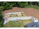 Backyard view from above shows retaining wall and patio seating at 809 Hillcrest Ln, Woodstock, GA 30189