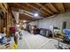 Spacious unfinished basement with exposed wood beams provides ample storage and customization options at 809 Hillcrest Ln, Woodstock, GA 30189