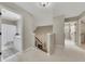 Open hallway leading to multiple rooms, showcasing the house's layout and natural light at 809 Hillcrest Ln, Woodstock, GA 30189
