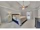 Spacious main bedroom with a tray ceiling, soft lighting, and serene ambiance at 809 Hillcrest Ln, Woodstock, GA 30189