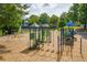 Colorful playground with various play structures for enjoyment at 809 Hillcrest Ln, Woodstock, GA 30189