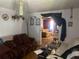 Inviting living room with comfortable seating and a glimpse into an adjacent room at 10199 Starr Sw St, Covington, GA 30014