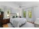 Serene main bedroom with hardwood floors, natural light, and elegant curtains, creating a tranquil retreat at 1879 Johnson Ne Rd # 10, Atlanta, GA 30306