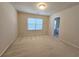 Neutral bedroom with carpet, a single window and view of an ensuite bathroom at 2104 Meadow Peak Rd, Duluth, GA 30097