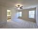 Spacious bedroom with ensuite bathroom, and two windows for natural light at 2104 Meadow Peak Rd, Duluth, GA 30097