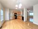Open concept living area with kitchen, dining, and living areas connected at 2104 Meadow Peak Rd, Duluth, GA 30097