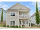 Charming two-story home with a welcoming front porch and second story balcony at 230 Fender Walk, Marietta, GA 30060
