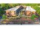 Aerial view of the complex, showcasing landscaping, a pool, and architecture at 1705 Monroe Ne Dr # D05, Atlanta, GA 30324