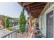 Balcony featuring a view of the complex, pool, and parking lot at 1705 Monroe Ne Dr # D05, Atlanta, GA 30324