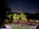 A beautiful night view overlooking the city skyline from a lovely landscaped yard and garden at 1705 Monroe Ne Dr # D05, Atlanta, GA 30324