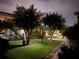 Manicured lawn featuring mature trees, walkways, and a view of the complex at 1705 Monroe Ne Dr # D05, Atlanta, GA 30324