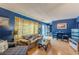 Bright living room with hardwood floors and views to kitchen and in-unit laundry at 1705 Monroe Ne Dr # D05, Atlanta, GA 30324