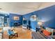 Living room featuring hardwood floors, laundry area, and entertainment center at 1705 Monroe Ne Dr # D05, Atlanta, GA 30324